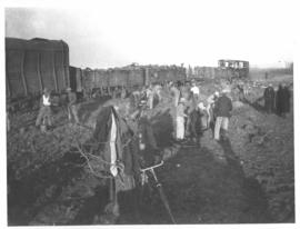 Leeudoringstad, 17 July 1932. Remains of 30 trucks after dynamite accident. Train loaded with deb...