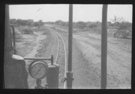 Naboomspruit, 1925. View from cab of Dutton roadrail tractor of the narrow gauge line to Singlewood.
