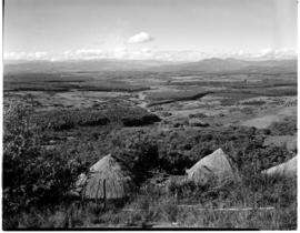 Tzaneen district, 1951. Duiwelskloof. View into valley with huts in the foreground.