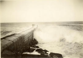 Sea wall at harbour entrance.