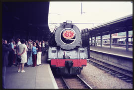 6 November 1976. SAR Class 15F with headboard 'Railway Society of SA Farewell 1791' at station.