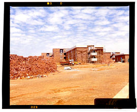 Bapsfontein, 1982. Hostel complex under construction at Sentrarand. [T Robberts]