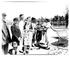 October 1949. Group at sports facility.