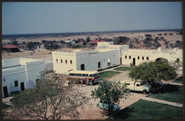 Etosha Game Park, Namibia, 1968. SAR GUY tour bus at Fort Namutoni rest camp.