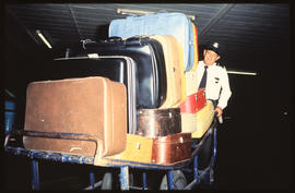 
Railway porter handling luggage.
