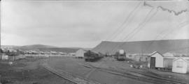 Noupoort, 1895. Trains in railway yard with railway housing on both sides. (EH Short)