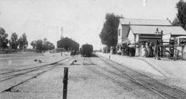 Lady Grey Bridge (later Huguenot), 1895. Station building with well-dressed crowd on platform loo...