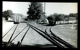 Natal. Narrow gauge railway tracks and goods wagons in railway station.