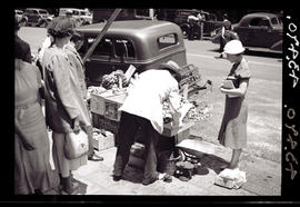 Johannesburg, 1935. Fruit stall on pavement.