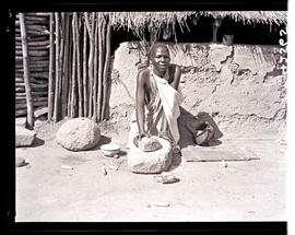 Northern Transvaal, 1934. Sesotho woman grinding mealies.