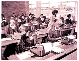 "Bethlehem, 1960. Interior of commercial high school, pupils in typing class."