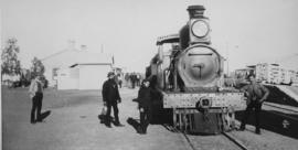 Klipplaat, 1895. Cape 4th Class Stephenson, later SAR Class 04 locomotive with men posing, statio...