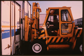 Johannesburg, May 1989. Forklifter handling container at Kaserne. [D Dannhauser]