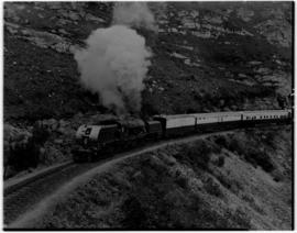 George district, 24 February 1948. Pilot Train climbing Montagu Pass, SAR Class GEA No 4026 leading.