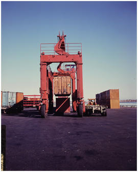Cape Town, January 1976. Straddle carrier at work in Table Bay harbour. [EG Butcher]