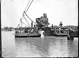 Upington, 1915. SAR Class 7 No 973 crossing Orange River on pontoon.