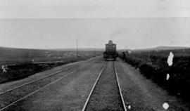 Surbiton, 1895. Locomotive at station. (EH Short)