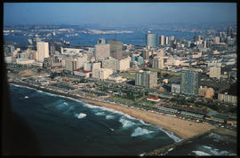 Durban, June 1975. Aerial view of beachfront and Durban Harbour. [EG Butcher]