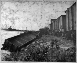 Durban, 21 April 1903. NGR goods truck in water after derailment at the Bluff.