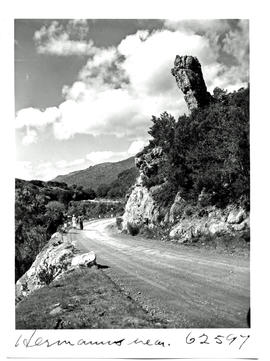 Hermanus district, 1954. Road past rock column.