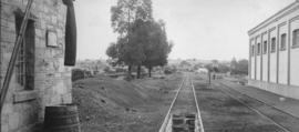 Kei Road, 1895. Railway line with part of station buildings. (EH Short)