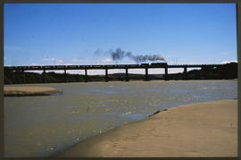 Northern Cape, September 1989. SAR Class 15CA with goods train on bridge over the Orange River. [...