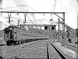 Johannesburg, 1951. SAR Class EMU with Reef passenger train.