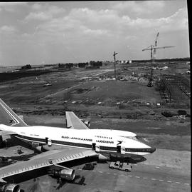 Johannesburg, circa 1979. Jan Smuts Airport. Boeing 747SP ZS-SPA 'Parmelia' near hangar construct...