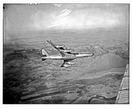 Pretoria district, 1968. SAA Boeing 707 ZS-SAE 'Windhoek' in flight over Hartbeespoort dam.