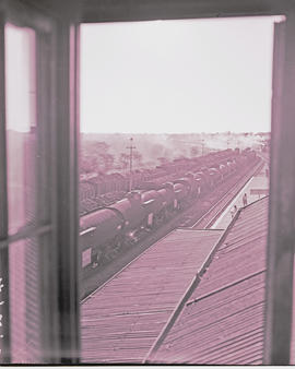 Komatipoort, 1945. Coal and petrol tanker train in station.