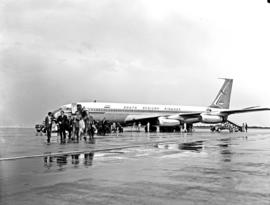 Cape Town, 1966. DF Malan airport. SAA Boeing 707, ZS-CKD, 'Cape Town, passengers disembarking. N...