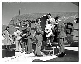 Johannesburg, 1945. Rand airport. SAA Lockheed Lodestar ZS-ATI, passengers boarding.