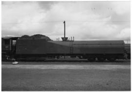 SAR Class 25NC No 3454. Showing modified condenser tender known by staff as 'Worshond' (Sausage d...