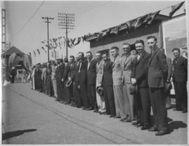 Durban, 1 December 1936. Arrival of first electric locomotive at Durban Platform 6. Line of men w...