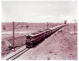 Potchefstroom district, 1966. SAR Class 5E1 Srs 2  leading SAR Class 5E Srs 2 with Blue Train.