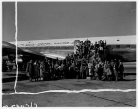 Circa 1960. Departure of SAA Douglas DC-7B ZS-DKG 'Chapman' to London, passengers embarking.