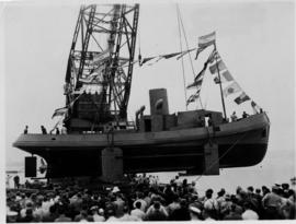 25 October 1945. Tug "Harry Cheadle" launched by crane.