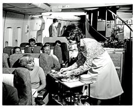 
SAA Boeing 747 interior. Cabin service. Hostess.
