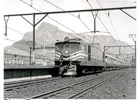 "Cape Town, 1970. SAR Class 4E leaving with Blue Train."