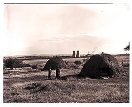 Colenso district, 1949. Small kraal with power station in the distance.