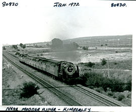 Kimberley district, 1972. SAR Class 25NC with passenger train near Modder River.