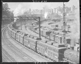 Johannesburg, 1945. Train of TZ type coke-lined diary wagons at Park station, viewed from the west.