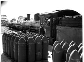 Johannesburg, October 1944. Bombs on platform next to SAR Class ? No 882 at Lenz.
