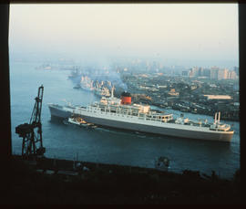 Durban, 1970. SAR tug escorting ship into Durban Harbour.