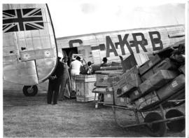 April 1948. Loading parcels at Avro Lancastrian Freighter G-AKRB.