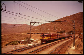 De Doorns district. SAR Class 4E passenger train at Osplaas having just crossed another train on ...