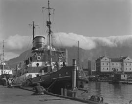 Cape Town, 1966. Tug 'RB Waterston' moored in Table Bay Harbour.
