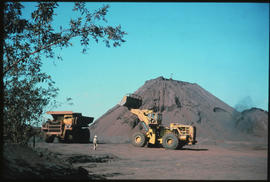 
Loading ore into mining truck.
