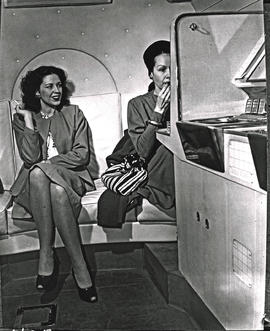 
SAA Lockheed Constellation interior. Women's lounge. Possibly a factory photograph?
