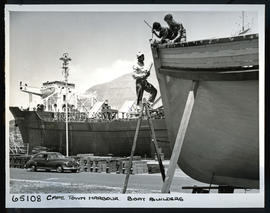Cape Town, 1956. Boat building in Table Bay harbour.